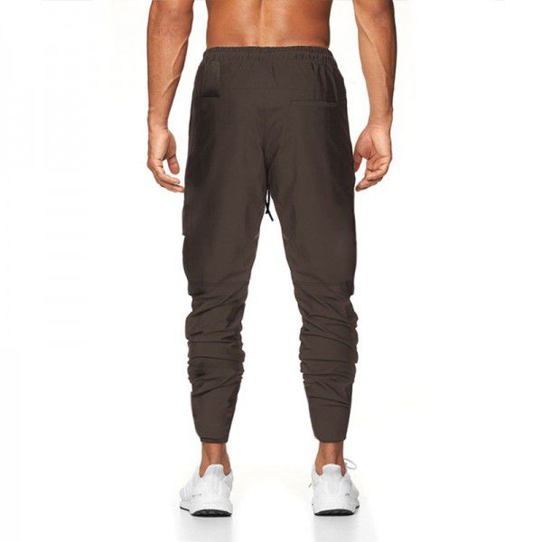 Summer men's casual pants, thin ice silk pants, men's multi pocket printed quick drying sports pants